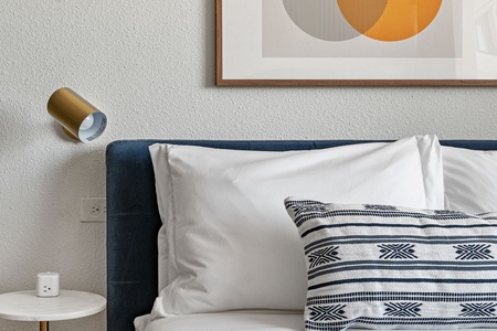Experience restful nights on a plush memory foam mattress.