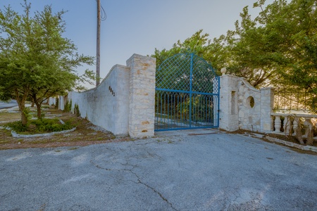 The entrance gate to this lakefront property