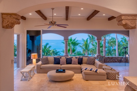 Another view of the sectional couch in the seating area by the patios.