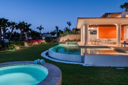 Left side view of villa Nirvana showing the outdoor pool and hot tub.