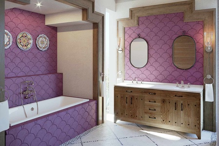 One of the bathrooms of La Datcha, with purple scale walls and double mirrors.