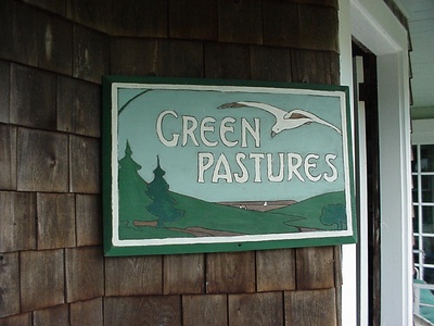 Entry into Green Pastures with charming sign