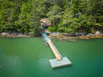 Aerial view of cottage and dock