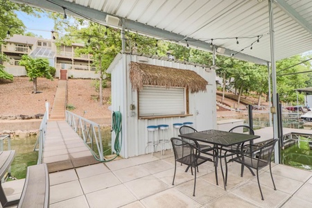 Tiki Bar with full size fridge inside