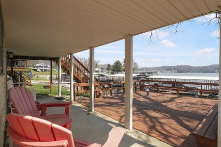 Relax in your private lakefront retreat with comfortable seating and stunning water views right from your covered porch.