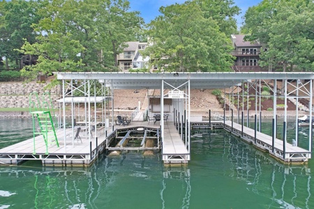 Large dock with swim platform~ dive steps~ tiki bar~ and sun loungers