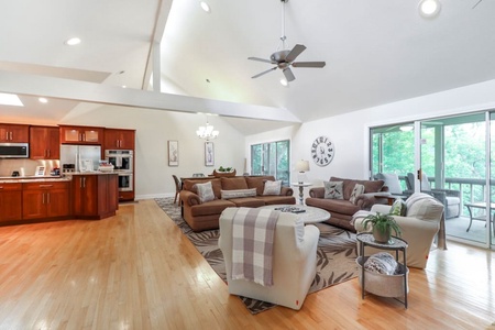 Livingroom~ dining and kitchen area in one large area! Perfect to make those family meals while the kids watch tv or play games!