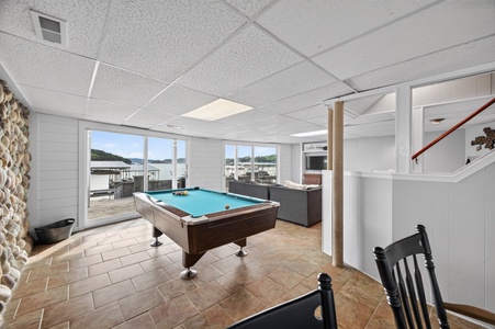 Your private game room opens to the waterfront deck, combining indoor fun with stunning marina views—perfect for friendly competition any time of day.