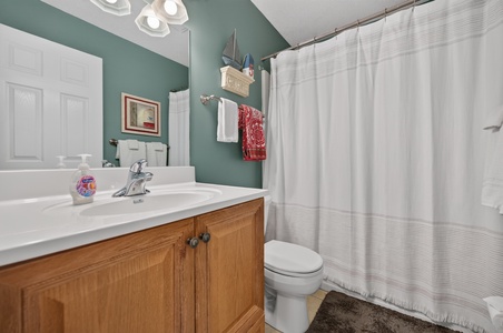 Freshen up in your private bathroom with a spacious vanity, soft lighting, and plenty of storage for your toiletries.