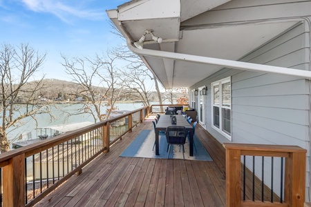 Your spacious waterfront deck offers stunning lake views where you can dine al fresco and unwind with serene water vistas.