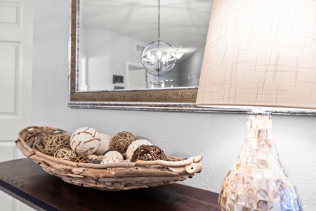 Thoughtful touches make your stay special - handcrafted decorative bowls and elegant lighting create a warm, welcoming atmosphere.