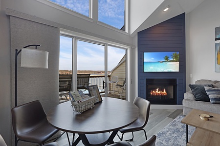 Relax by your crackling fireplace while watching the wall-mounted TV, then step onto your private balcony for outdoor moments.
