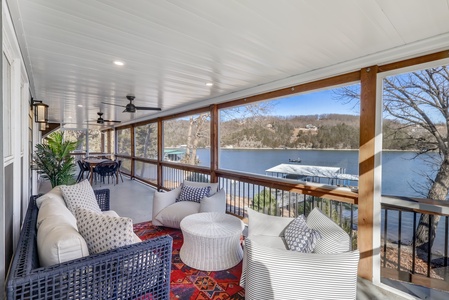 Relax on your private covered deck with stunning lake views, comfortable seating, and gentle breezes.