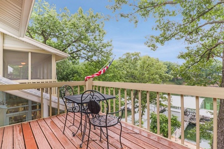 Private patio overlooking the lake off the double queen bedroom.