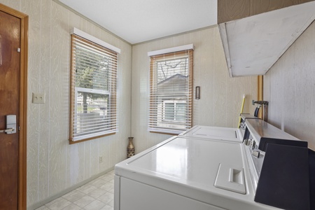 Your dedicated laundry space features modern appliances and natural light, making laundry days effortless during your stay.
