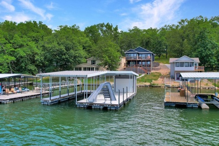 The Dock- with water slide, kayak and Paddle board