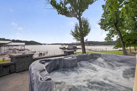 Slip into the bubbling hot tub and take in sweeping lake views framed by mature trees and peaceful shoreline. Perfect for unwinding after a day on the water.