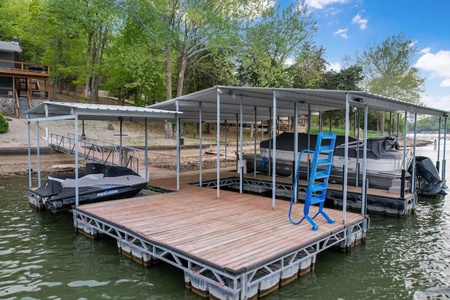 Large private dock with swim platform and boat slip