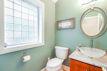 Half bathroom off the kitchen.
