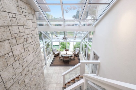 Sunroom and stairs.