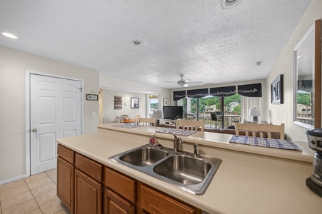 Cook, dine, and unwind together in your open-plan kitchen and living space with plenty of counter room, natural light, and easy access to your private outdoor balcony.