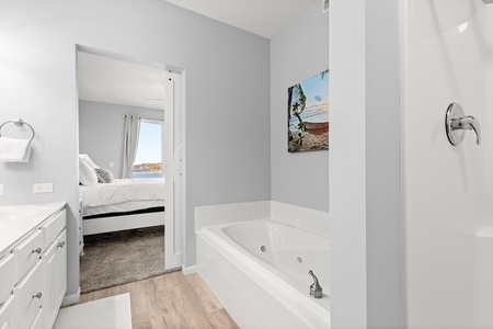 Unwind in your private spa-style bathroom with a deep soaking tub and separate shower after exploring the day.