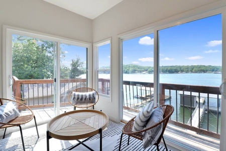 Beautiful warm seating area with sliding door to the outside just off the kitchen