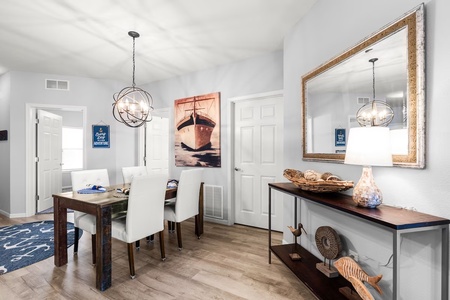 Enjoy meals in your elegant dining space with nautical touches and warm lighting that creates the perfect atmosphere for memorable dinners.