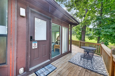 Step onto your private deck surrounded by lush greenery—perfect for morning coffee or a peaceful evening under the trees with nature all around you.
