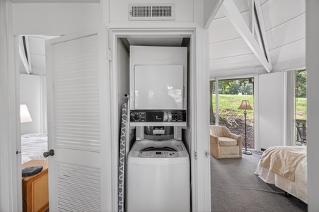 Your convenience is covered with in-unit laundry tucked neatly away, making it easy to refresh your wardrobe during your stay while enjoying the bright, peaceful surroundings.