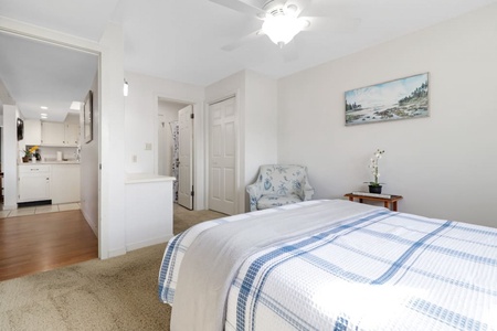 Guest Bedroom with Shared attached bathroom to kitchen and livingroom