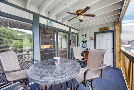 Step onto your private covered balcony and feel the lake breeze while dining under the ceiling fan, perfect for morning coffee or sunset cocktails overlooking the marina.