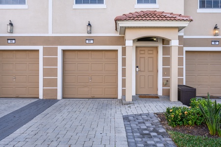 Outdoors Building - Complimentary Driveway Parking and 1 Car Garage