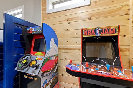 Arcade games in the upstairs bunk/game room loft