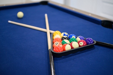 Up for shooting some pool in the game room?