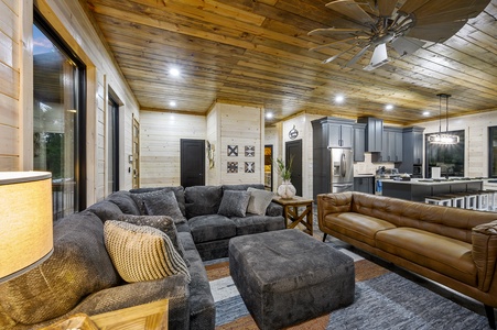 Living room opens to the kitchen and dining space