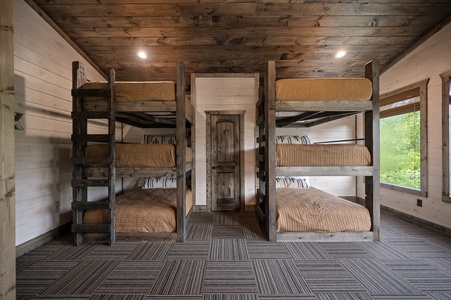 Girls' bunk room with 6 double beds sleeping up to 12 guests
