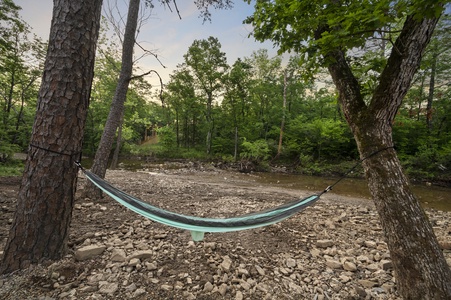 Relax in one of the hammocks by the creek