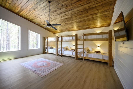Upstairs bunk room (sleeps 21) - double stacked queen bunk beds shown