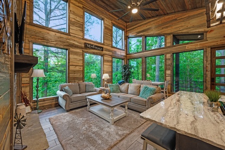 Floor-to-ceiling windows immerse you in nature's beauty