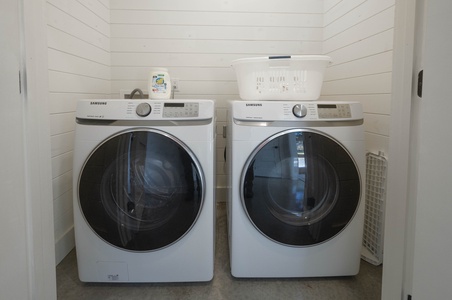 Laundry closet with full-size washer and dryer