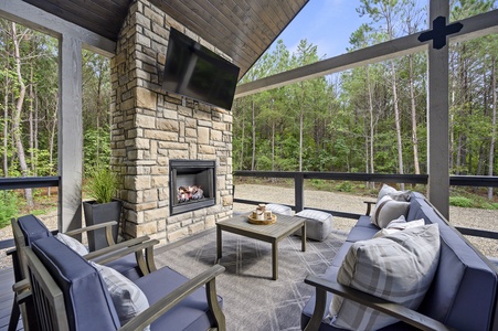 Back deck features a gas fireplace and Smart HDTV
