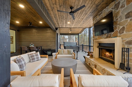 Outdoor entertaining space with wood-burning fireplace