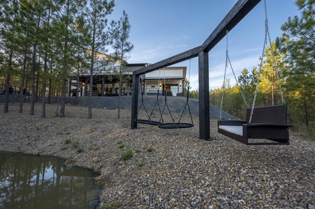 Enjoy the peaceful pond from the disk swings and swing bed