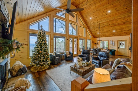 Floor-to-ceiling windows highlight the stunning mountain views