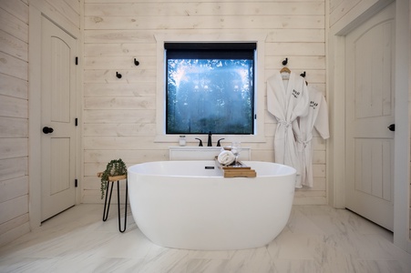 Take a warm bubble bath in the soaking tub