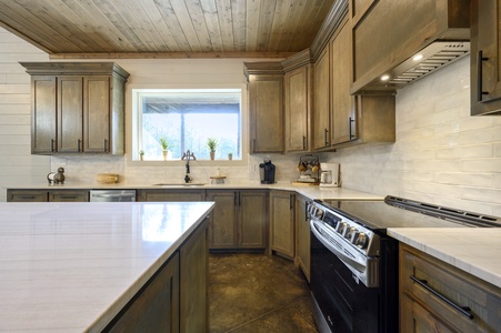 Spacious kitchen provides plenty of countertop space for preparing meals