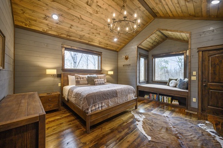 Downstairs master bedroom #1 with king bed and custom reading nook