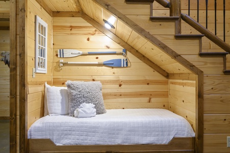 Single bed nook in living room under stairs (sleeps 1)