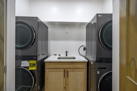 Laundry room with double washer/dryer set